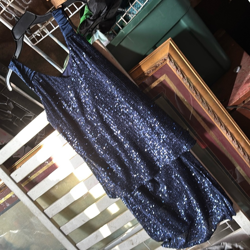 Navy blue two piece shirt and skirt size small tags still on it never worn